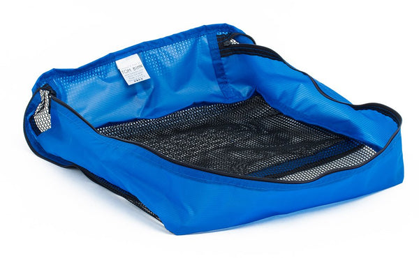 An empty and open Island (blue) Aether Large Aeronaut 45 Packing Cube.
